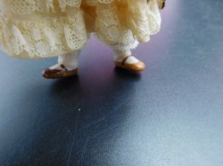 BISQUE DOLL BLUE BOWS C